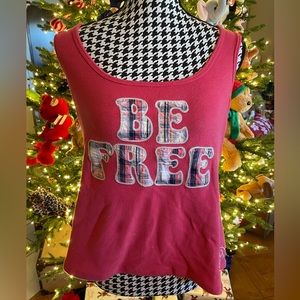 Tank top by INC that reads ‘BE FREE’ with peace symbols on the bottom and back